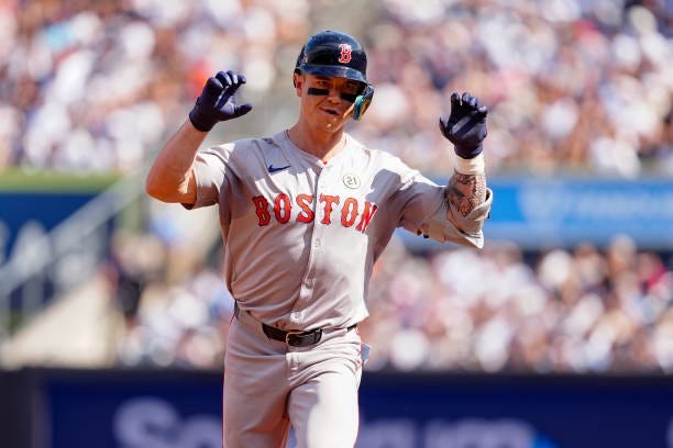 Boston Red Sox Right Fielder Tyler O'Neill reacts to hitting a two run home run as he rounds the bases during the fourth inning of the Major League...