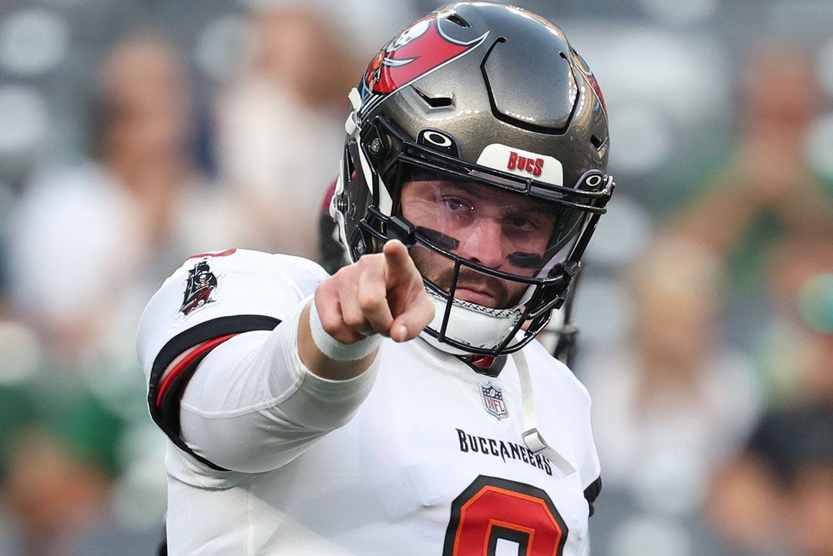 A renewed Baker Mayfield pointing confidently A renewed Baker Mayfield pointing confidently