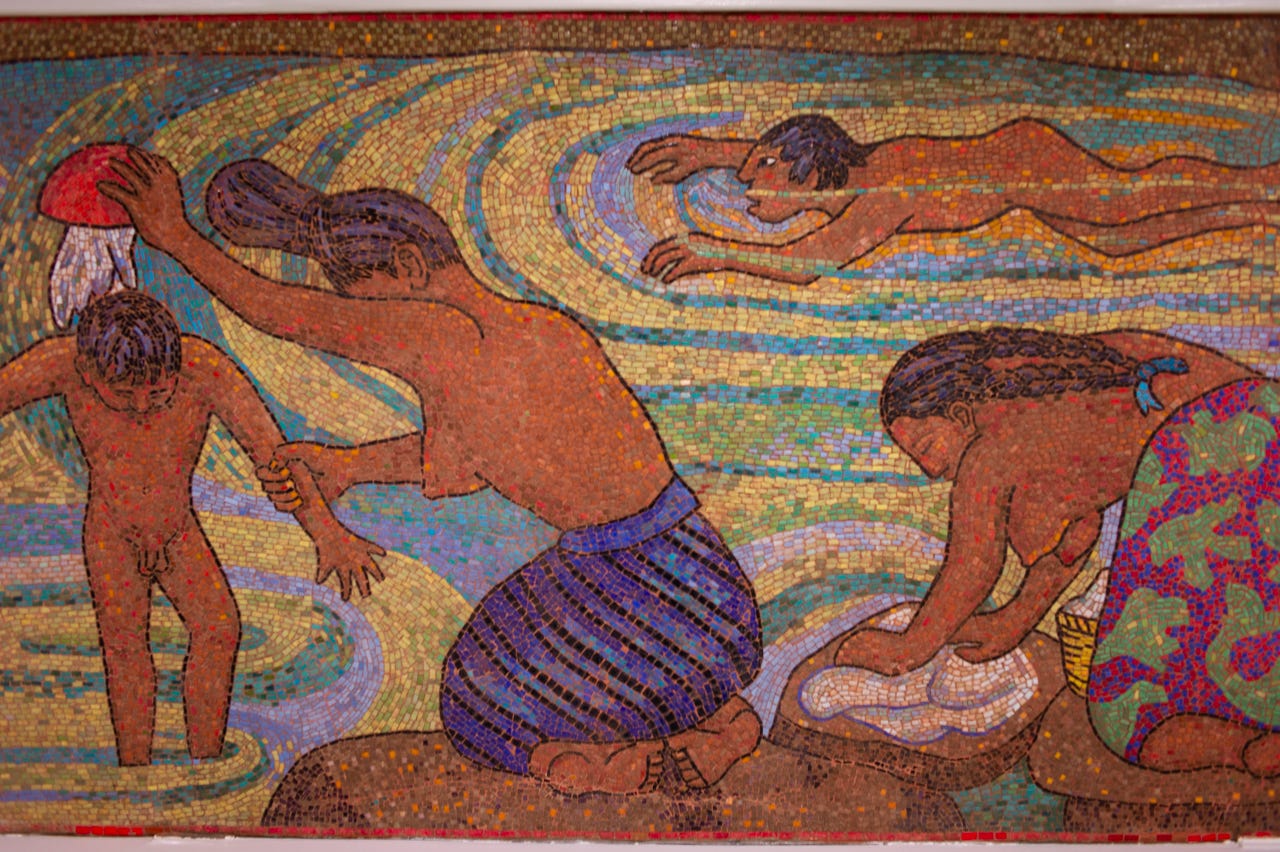 A mosaic of women washing clothes

Description automatically generated