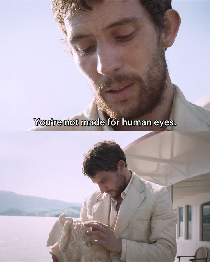 This may contain: a man in a white suit holding a dog and looking down at his hand with the caption you're not made for human eyes
