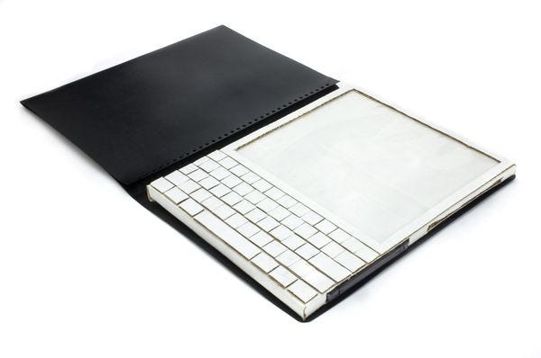 Photo of the Dynabook concept, made from cardboard by Alan Kay in 1968.