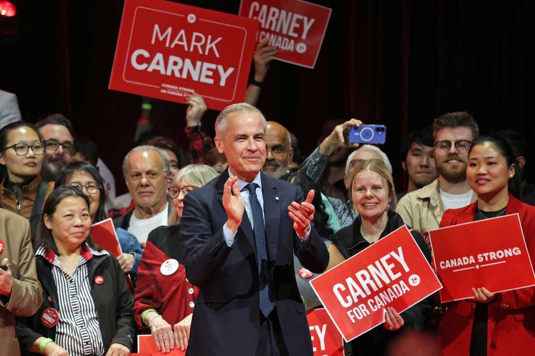 Canada's Prime Minister and Liberal Party leader Mark Carney applauds at a victory party in Ottawa, Ontario on Tuesday.
