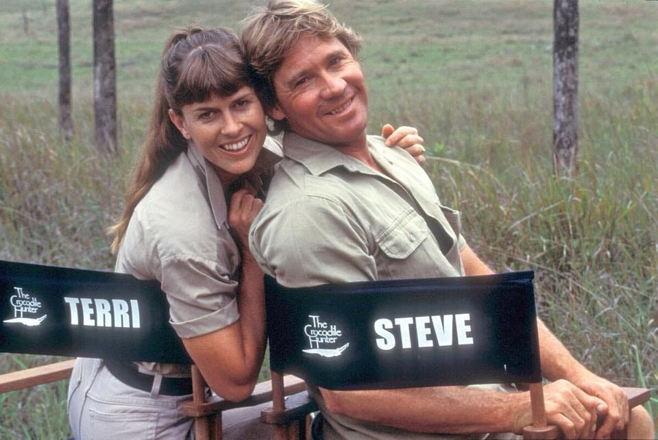 Terri and Steve Irwin sitting in director chairs with their names on them on set of The Crocodile Hunter: Collision Course.