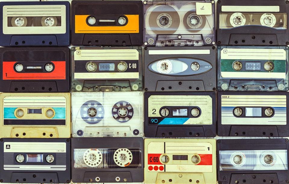 16 retro cassette tapes laid out next to each other in a grid. Image credit: GETTY