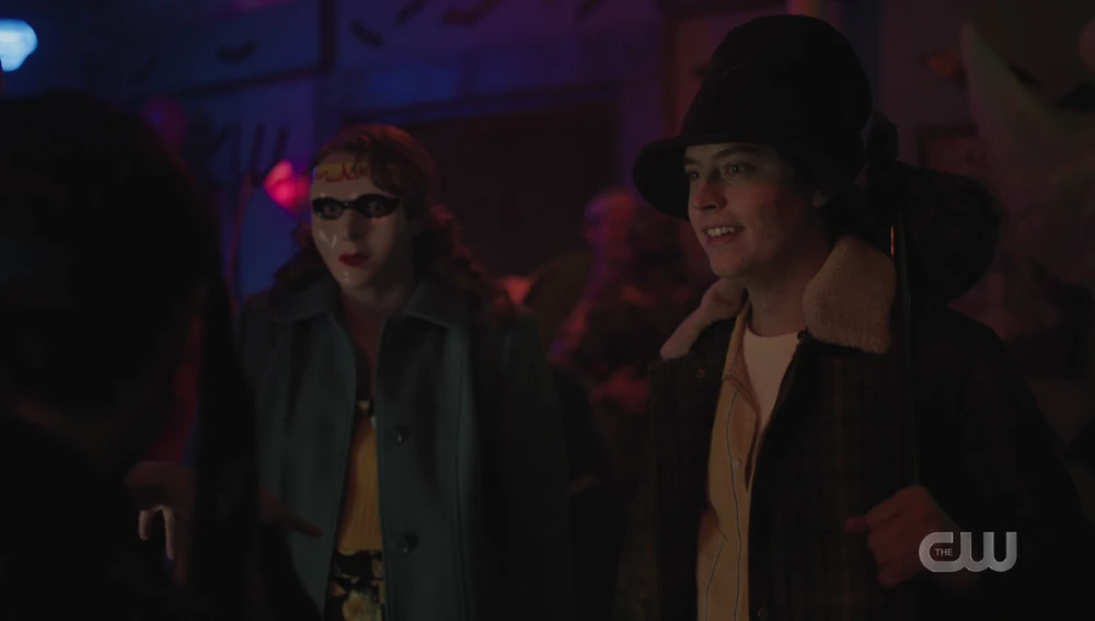 Ethel wearing a scary mask and Jughead wearing a hobo costume