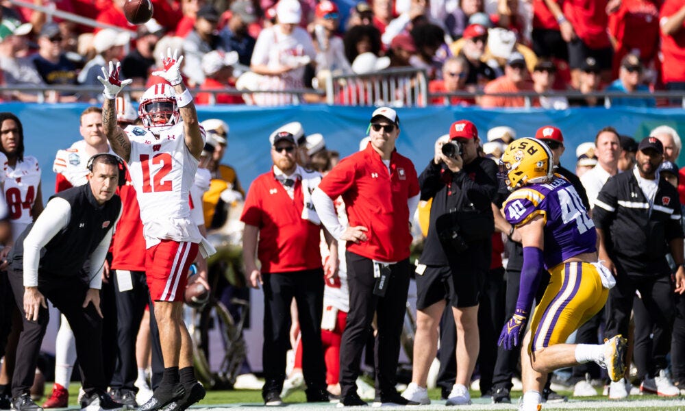 Wisconsin football; Badgers wide receiver Trech Kekahuna catches the ball against LSU