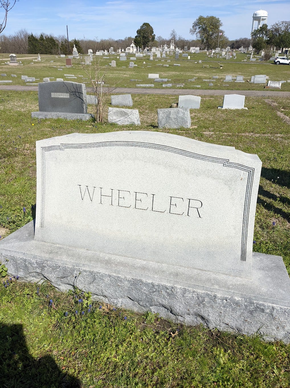 description: gravestone with the word Wheeler written on it