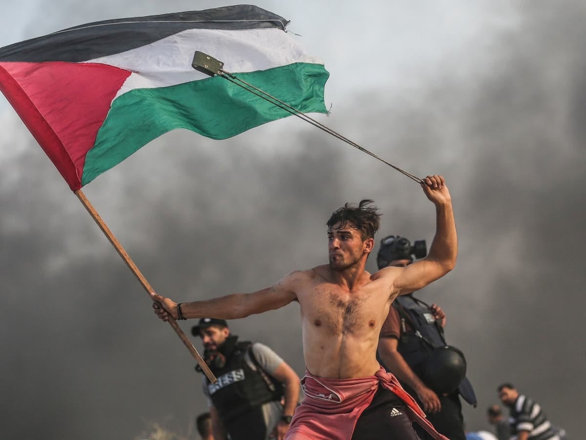 Stop romanticising that viral image of a Palestinian protester – it's not a  poetic moment | The Independent | The Independent