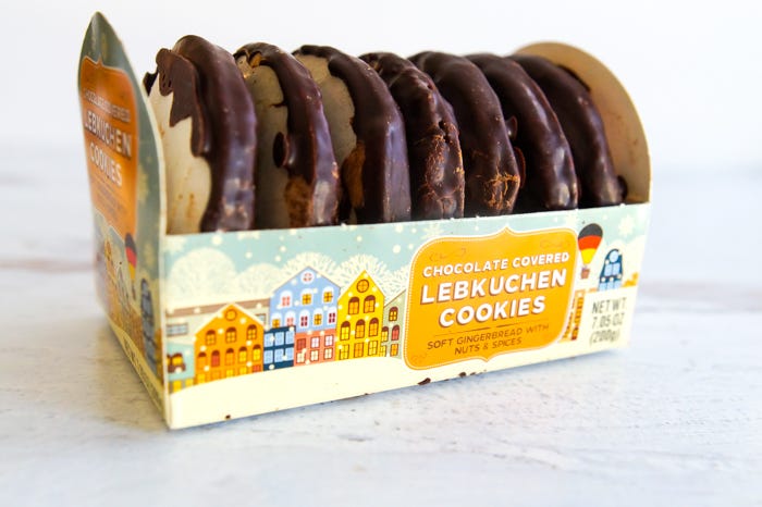 A misleadingly enticing photo of Chocolate Covered Lebkuchen Cookies in a colorful cardboard box.