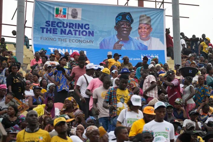 Supporters of Bola Ahmed Tinubu, presidential candidate of the All Progressives Congress, Nigeria ruling party during an election campaign rally at the Teslim Balogun Stadium in Lagos Nigeria, Tuesday, Feb. 21, 2023. Fueled by high unemployment and growing insecurity, younger Nigerians are mobilizing in record numbers to take part in this month's presidential election. (AP Photo/Sunday Alamba)