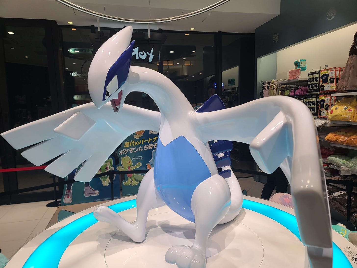 Lugia is the mascot for the Kyoto Pokémon Center store, represented by this impressive statue
