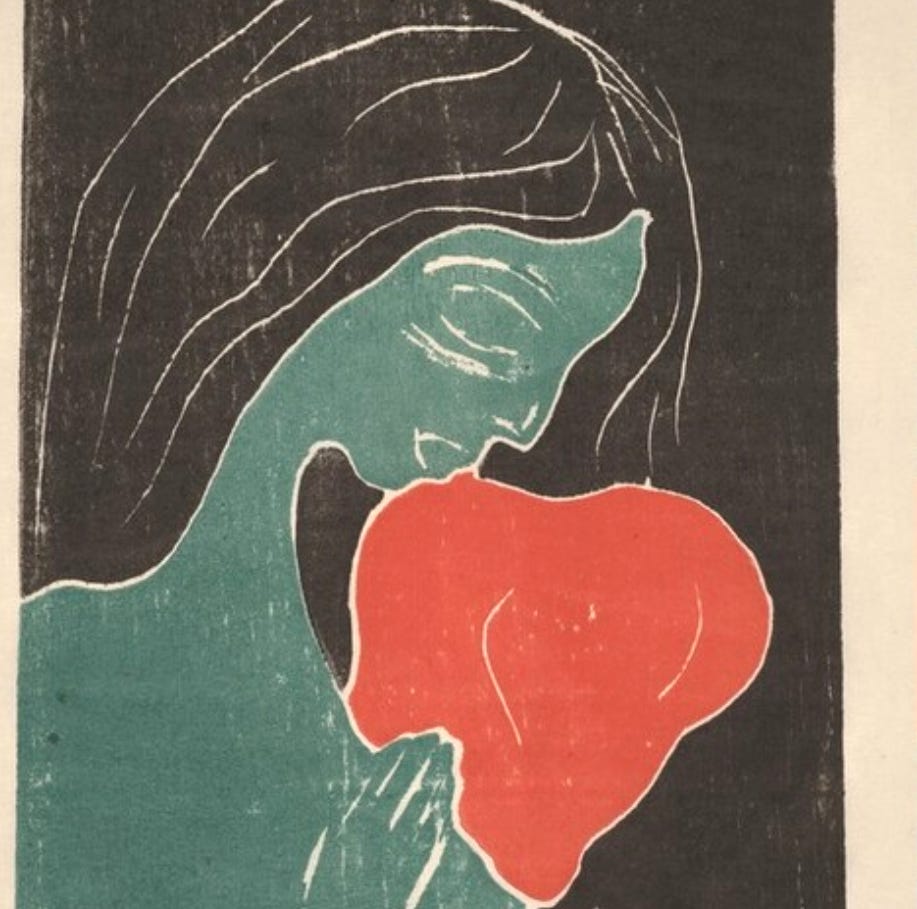 A woodcut of a woman in profile against a black background; her skin is green, her hair black, her face lowered to bestow a kiss on the red heart she holds in her hands.
