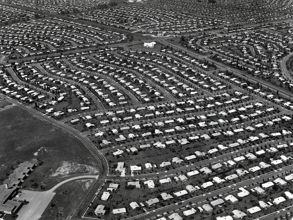 Image of thousands of cookie cutter houses in a suburban development