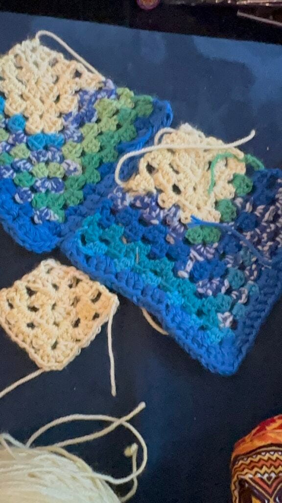 Blue, green and yellow crocheted tiles