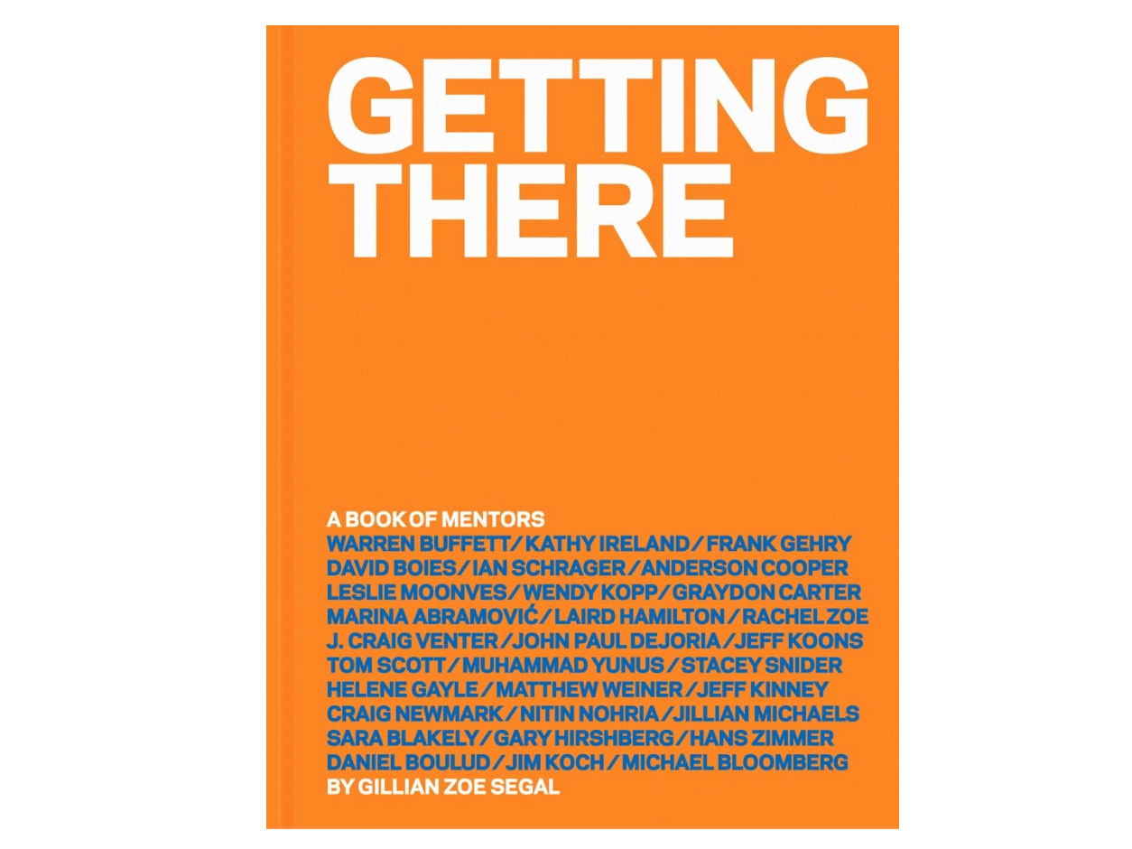 An orange book with "Getting There" in the title at the top. The text is white. 