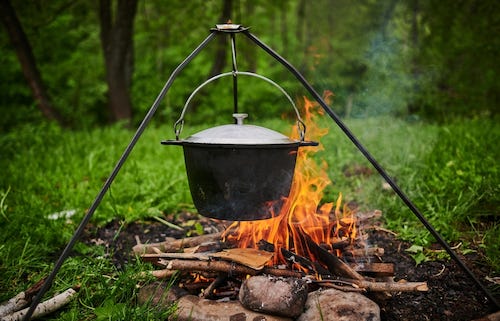 cookpot over campfire