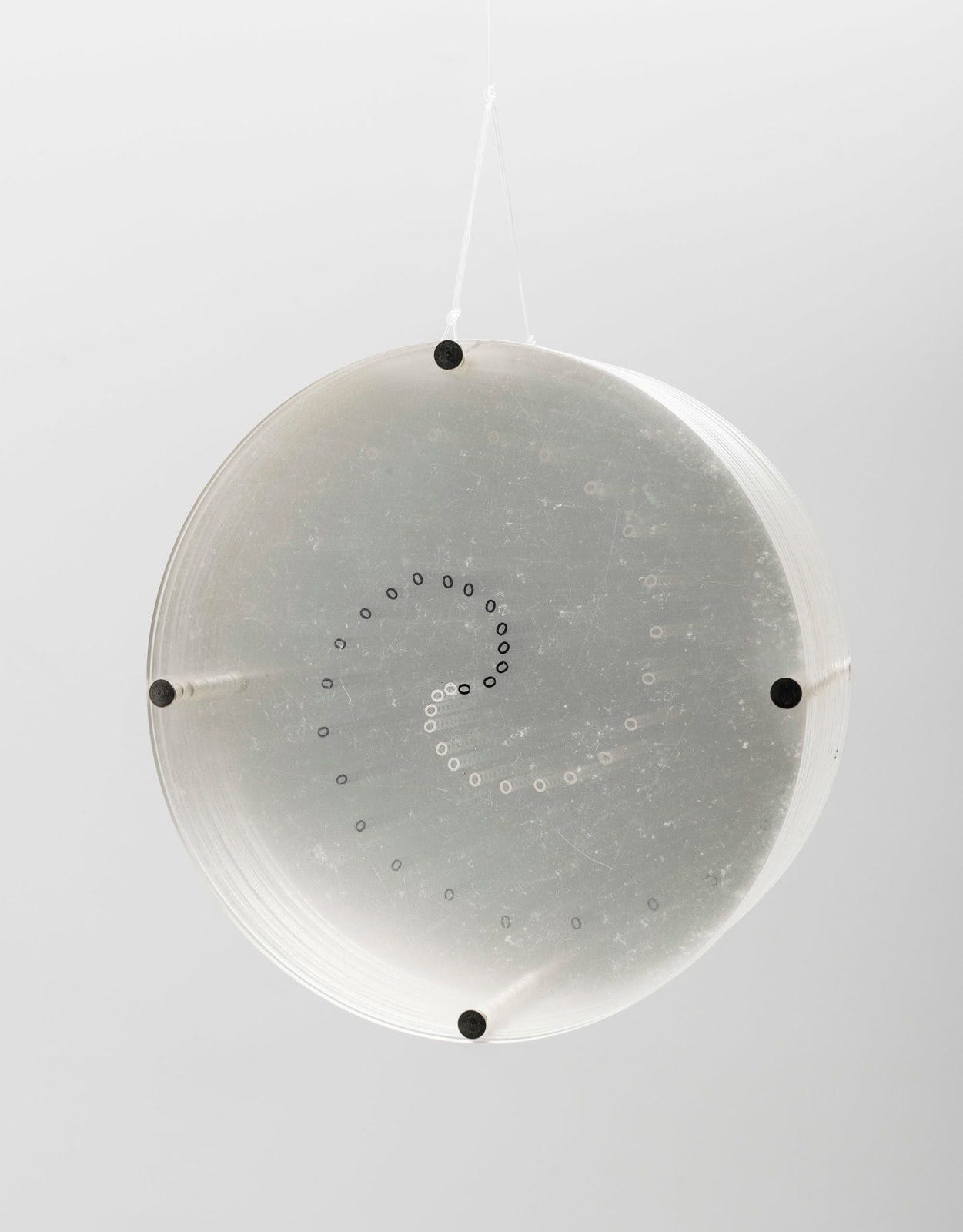 Mira Schendel, Untitled, [from the series ‘Discos’], (acrylic, letraset and screws), 1971 [Galatea, São Paulo and Salvador. Art: © Estate of Mira Schendel. Photo: © Ding Musa]