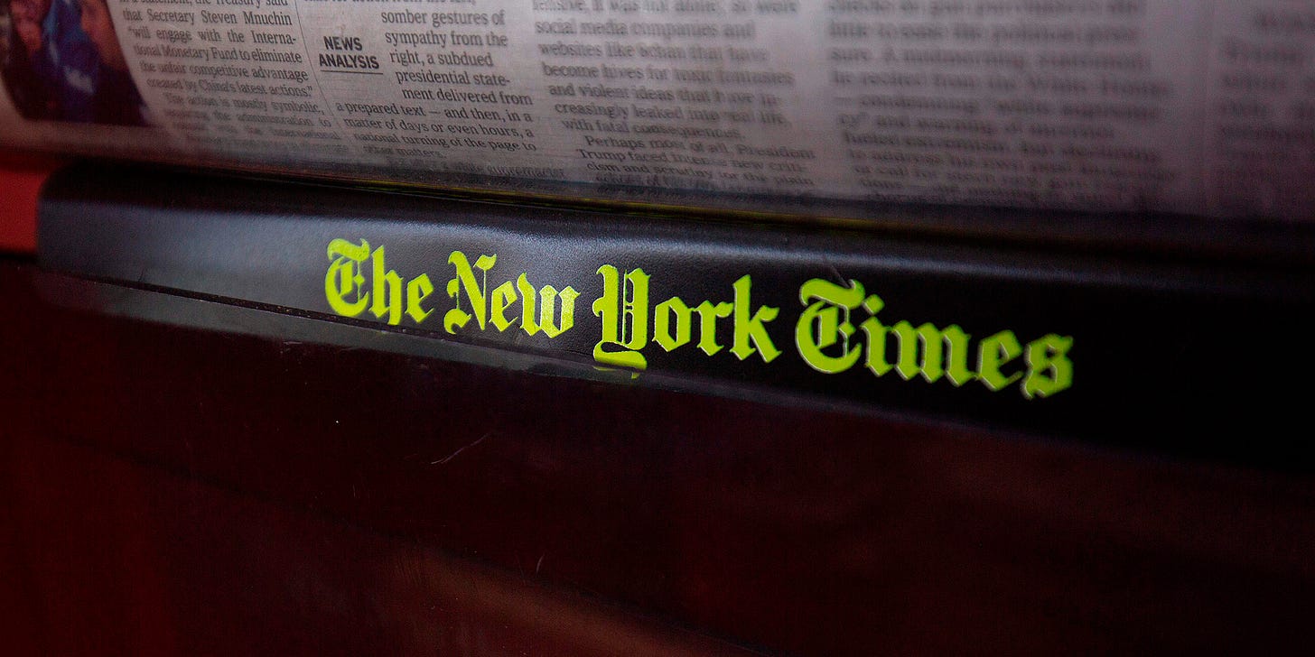 The New York Times logo is seen on a newspaper rack at a convenience store in Washington, DC, on August 6, 2019. (Photo by Alastair Pike / AFP) (Photo by ALASTAIR PIKE/AFP via Getty Images)
