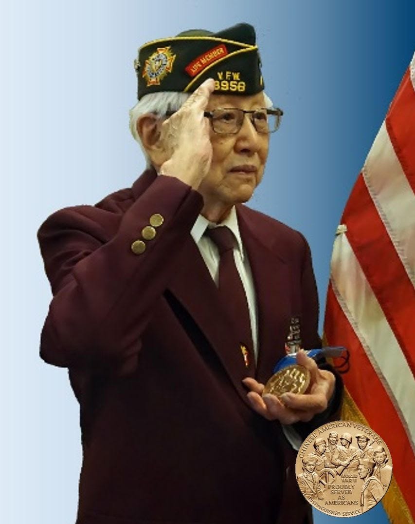 Photograph of service member Alfred Chan holding the Congressional Gold Medal as awarded to Chinese American veterans of WWII for their distinguished service.