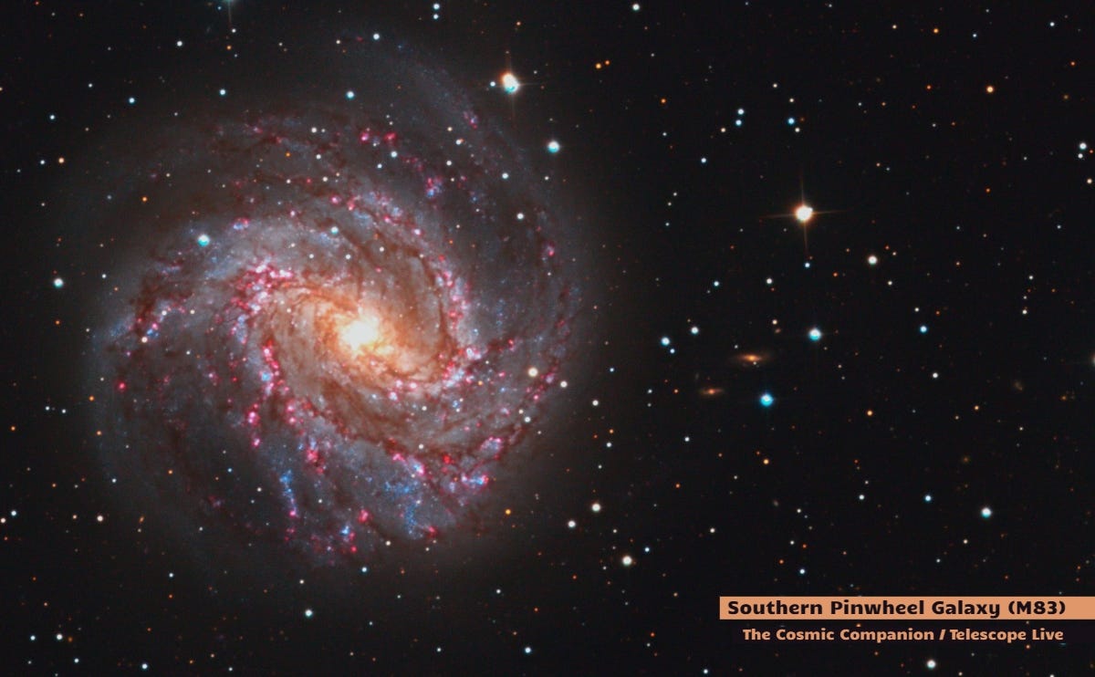 M83 - The Southern Pinwheel Galaxy, seen here on the left is a spiral galaxy with red and blue regions.