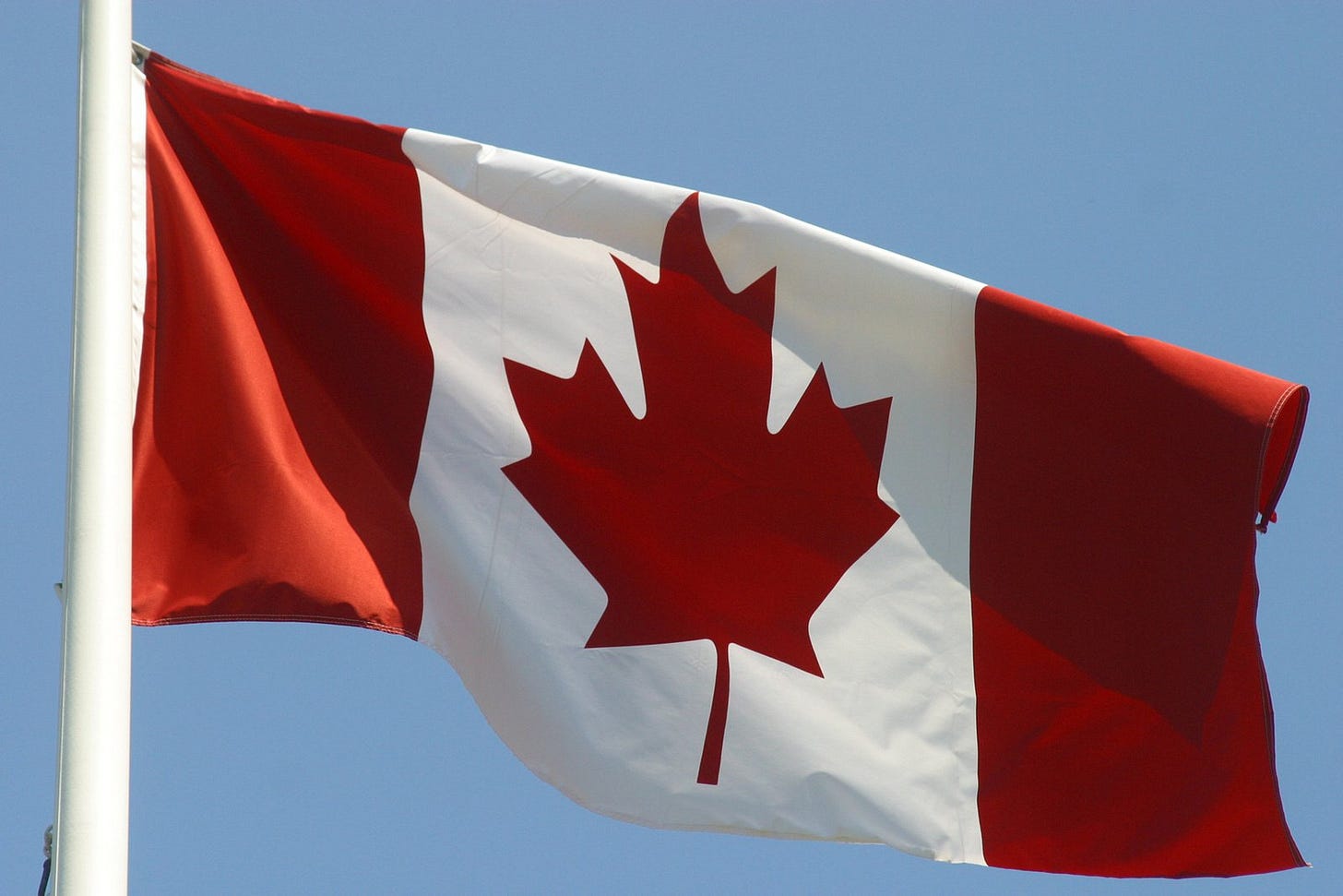 https://images.freeimages.com/images/large-previews/d65/canadian-flag-1534780.jpg