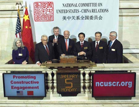 Former U.S. Secretary of State, Henry Kissinger ringing the bell of the New York Stock Exchange (NYSE) on the 30th anniversary of the establishment of diplomatic relations between the United States and China.
