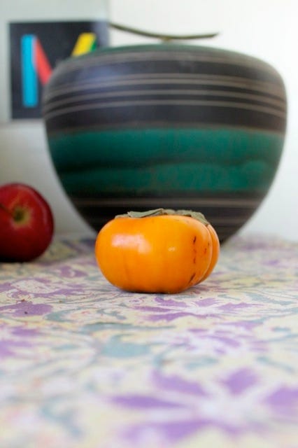 Vase and persimmon