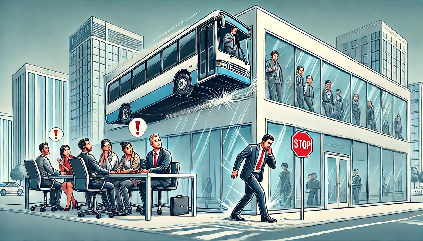 An illustration showing the risk of a team member leaving, symbolized by a team member getting hit by a bus. The image features a group of people working together in an office environment. One person is outside the office building, near a bus stop, with a bus approaching dangerously close. The rest of the team inside the office looks worried and distressed, indicating the impact of the potential loss. The illustration should have a serious and cautionary tone, with clear emphasis on the vulnerability and the consequences of losing a team member unexpectedly.