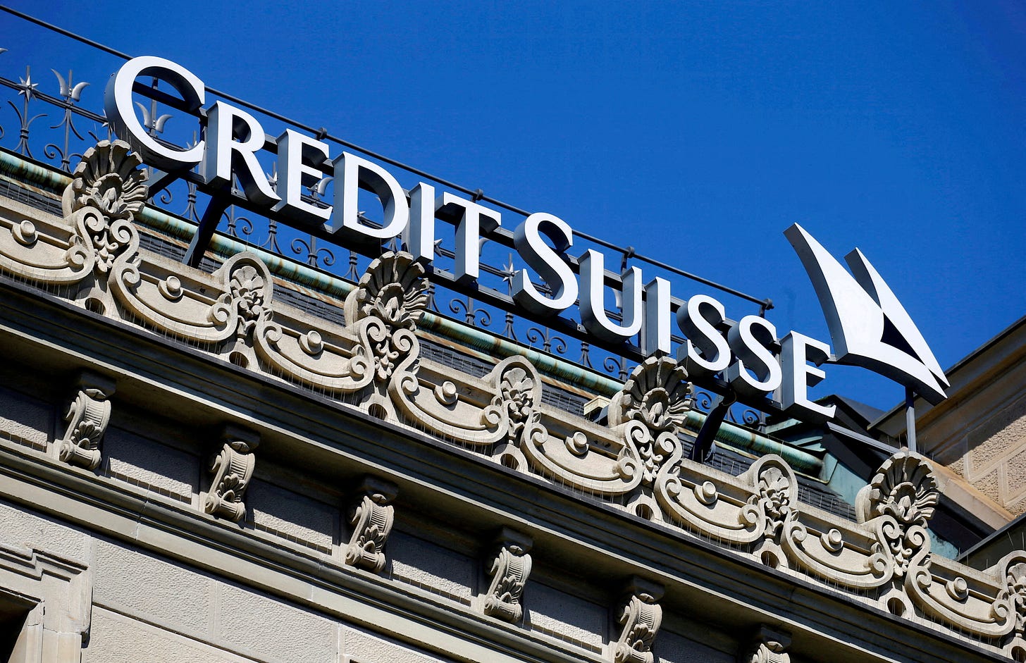 Credit Suisse stock slump triggers close monitoring by regulators | Reuters