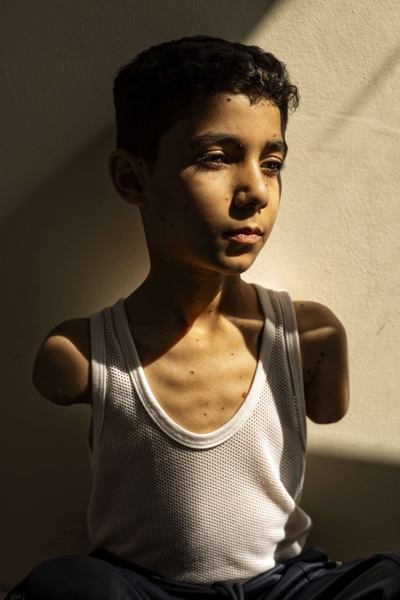 “Mahmoud Ajjour, Aged Nine” by Samar Abu Elouf for the New York Times