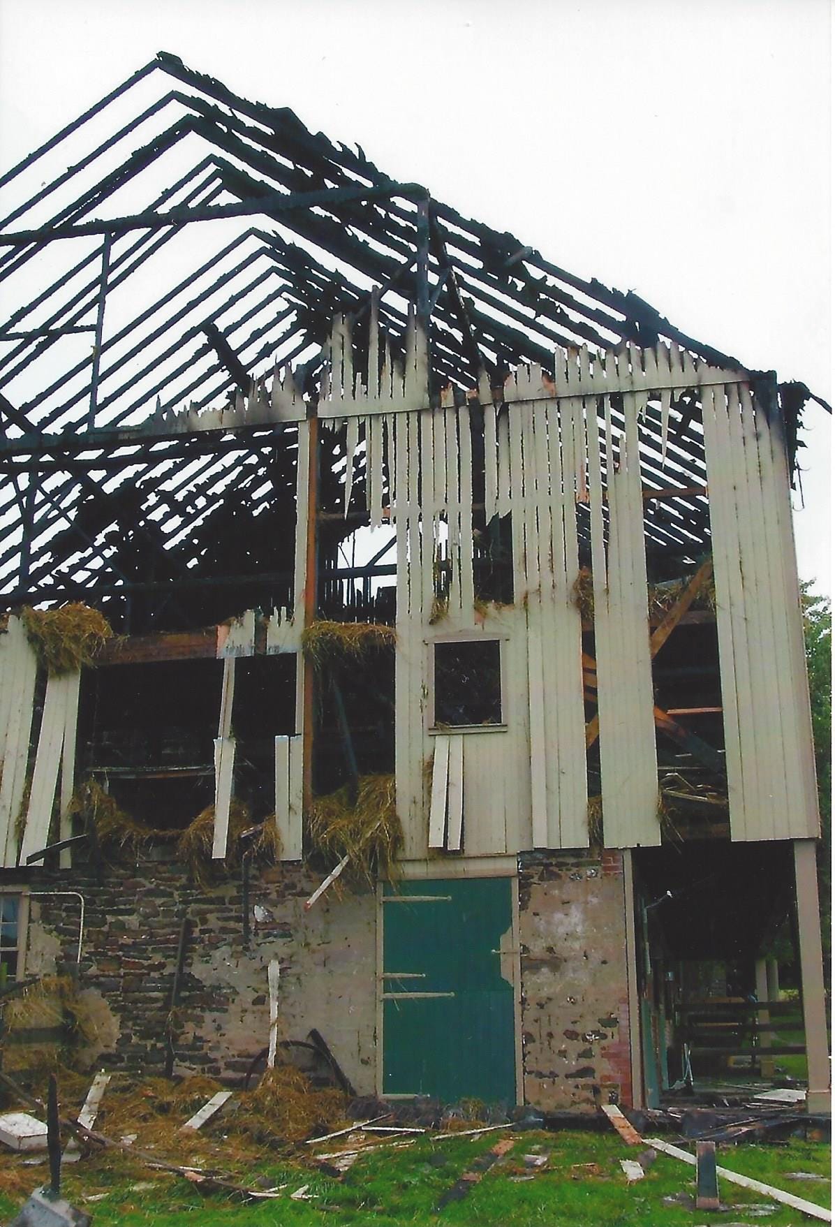 The remains of a barn destroyed by fire