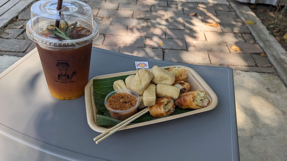 tofu, springrolls and an iced orange coffee tofu, springrolls and an iced orange coffee