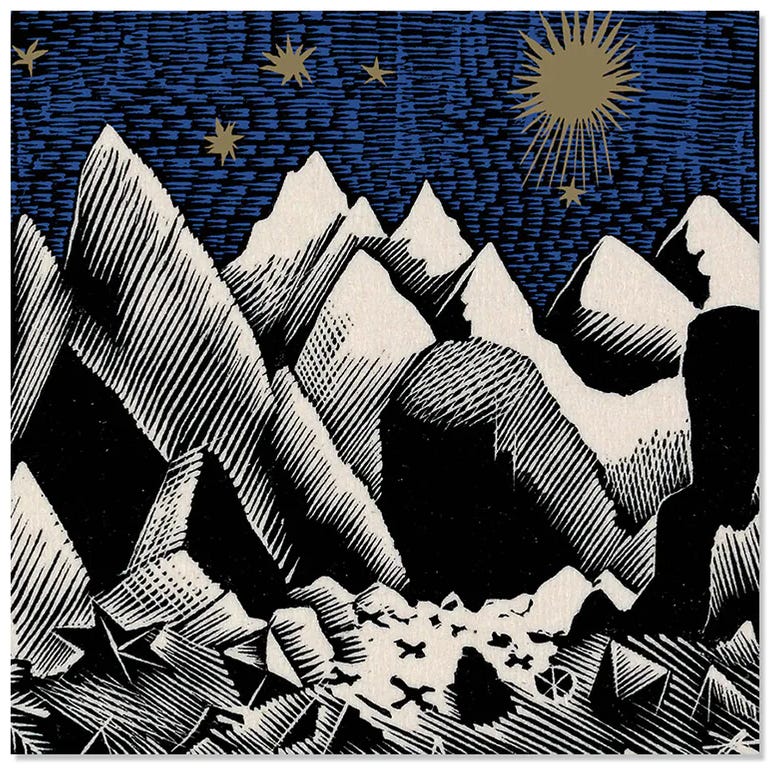 christmas card depicting rocky landscape with stars
