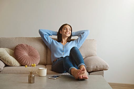 Young Woman On The Couch Stock Photo - Download Image Now - Relaxation, Sofa,  Women - iStock
