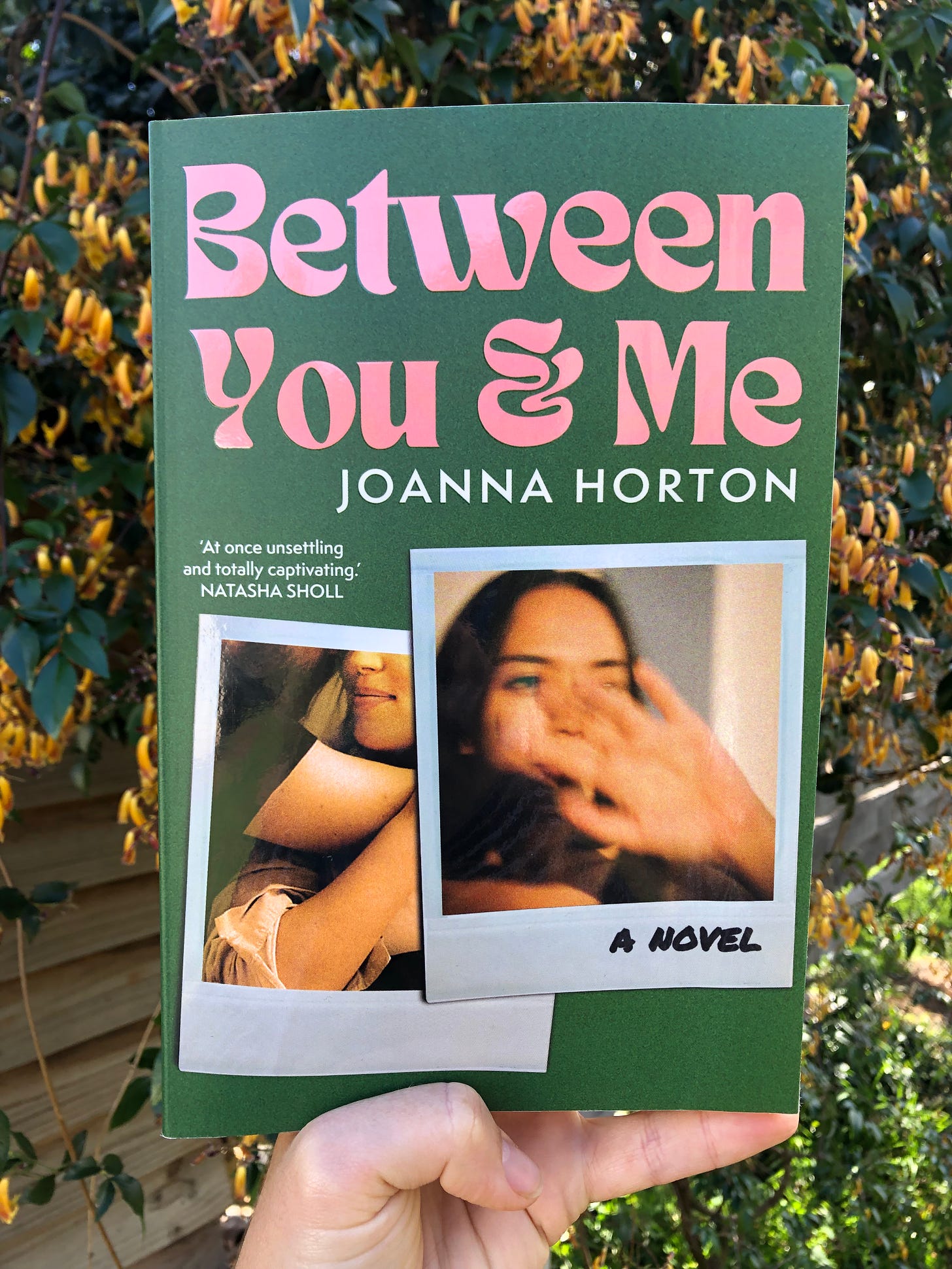 book cover showing fragments of two white women. book is called Between You and Me