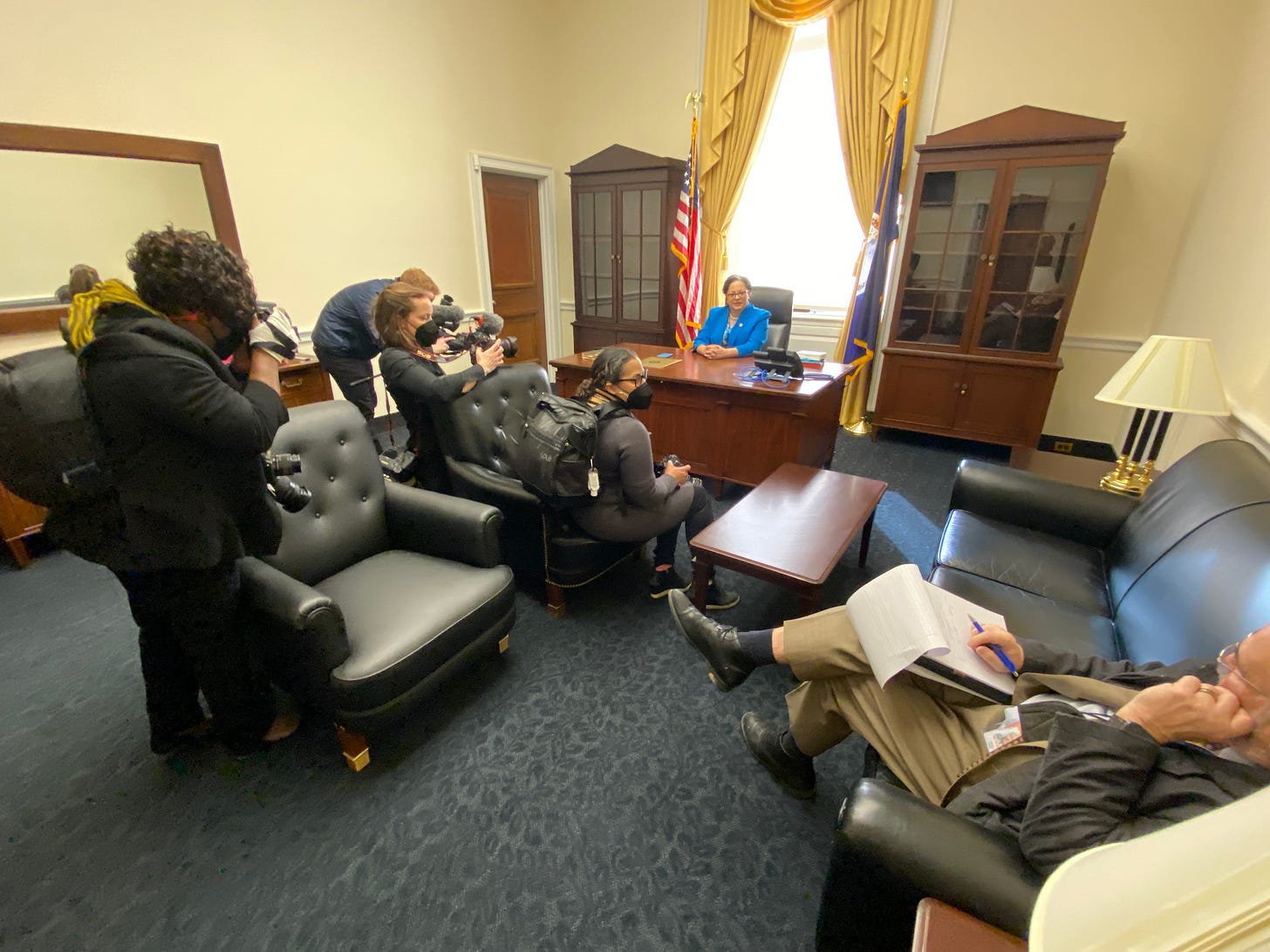 Rep. Jennifer McClellan speaks with reporters in her new office