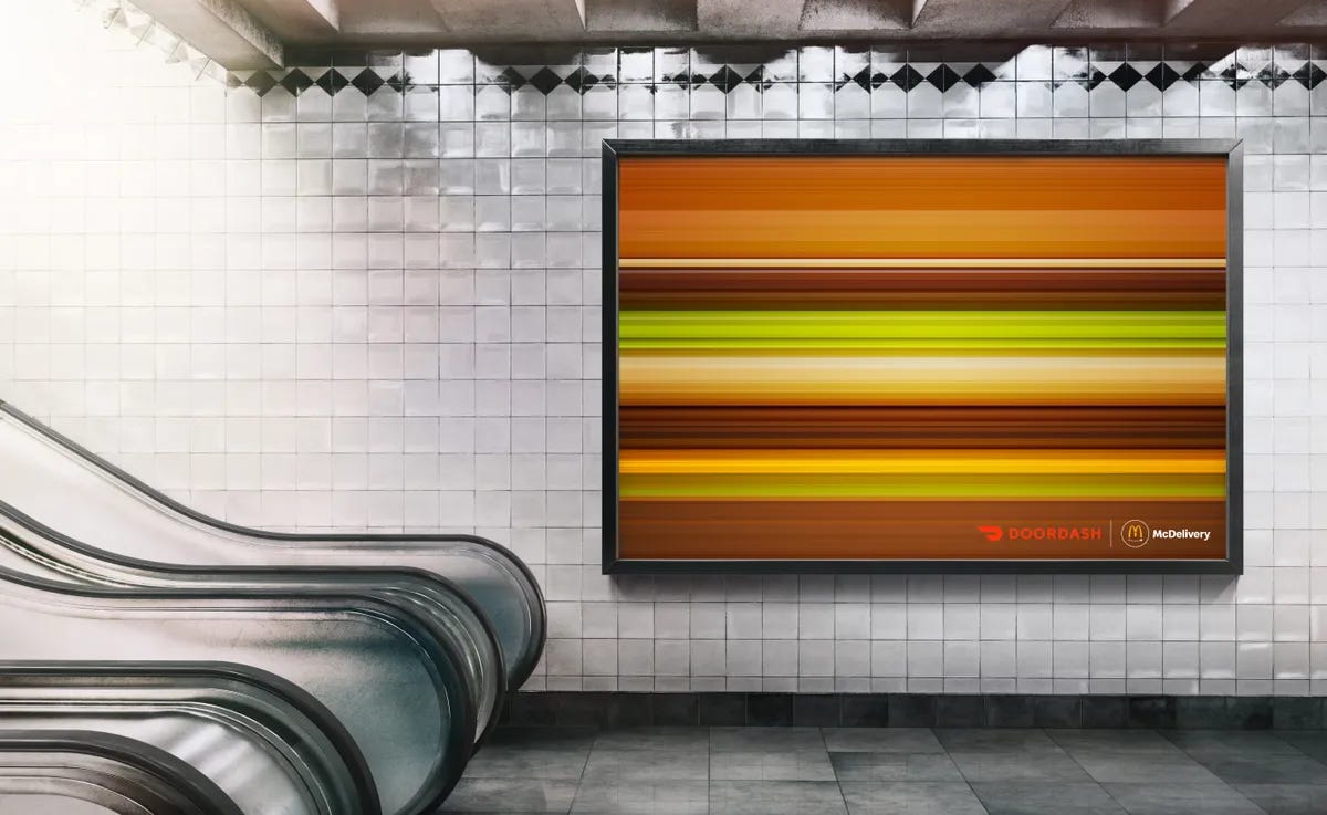 A screen on the wall of an escalator

Description automatically generated