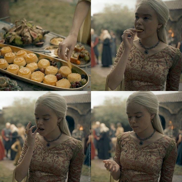 Rhaenyra eating lemon slices off lemon cakes.