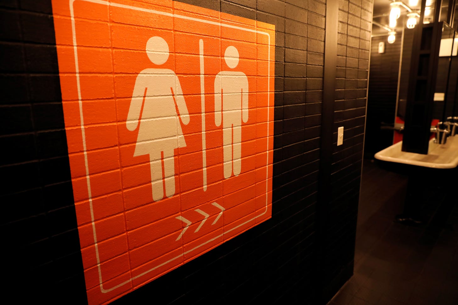 Arkansas enacts law restricting school bathroom use by transgender people |  Reuters