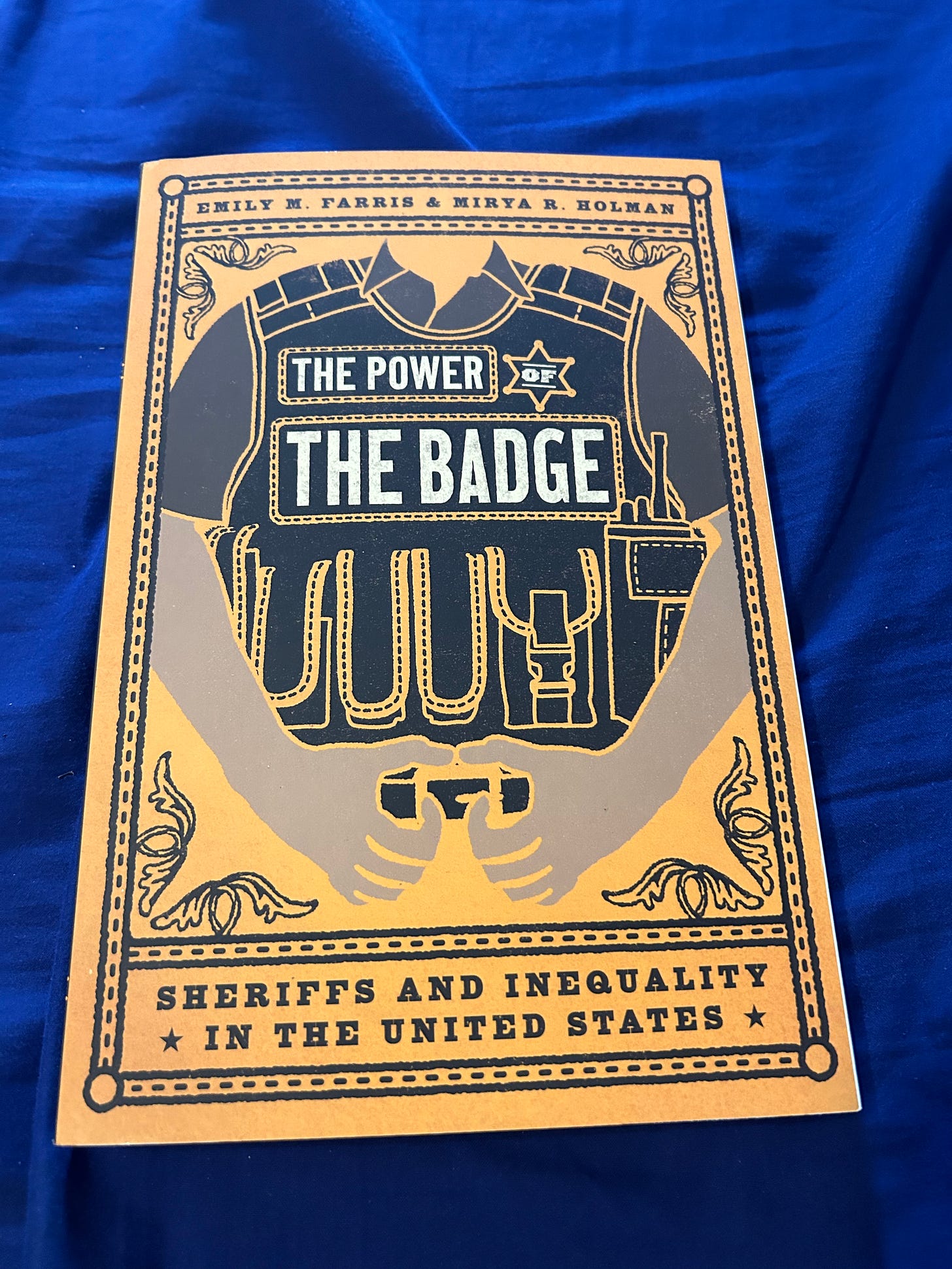 Phot of the book Power of the Badge