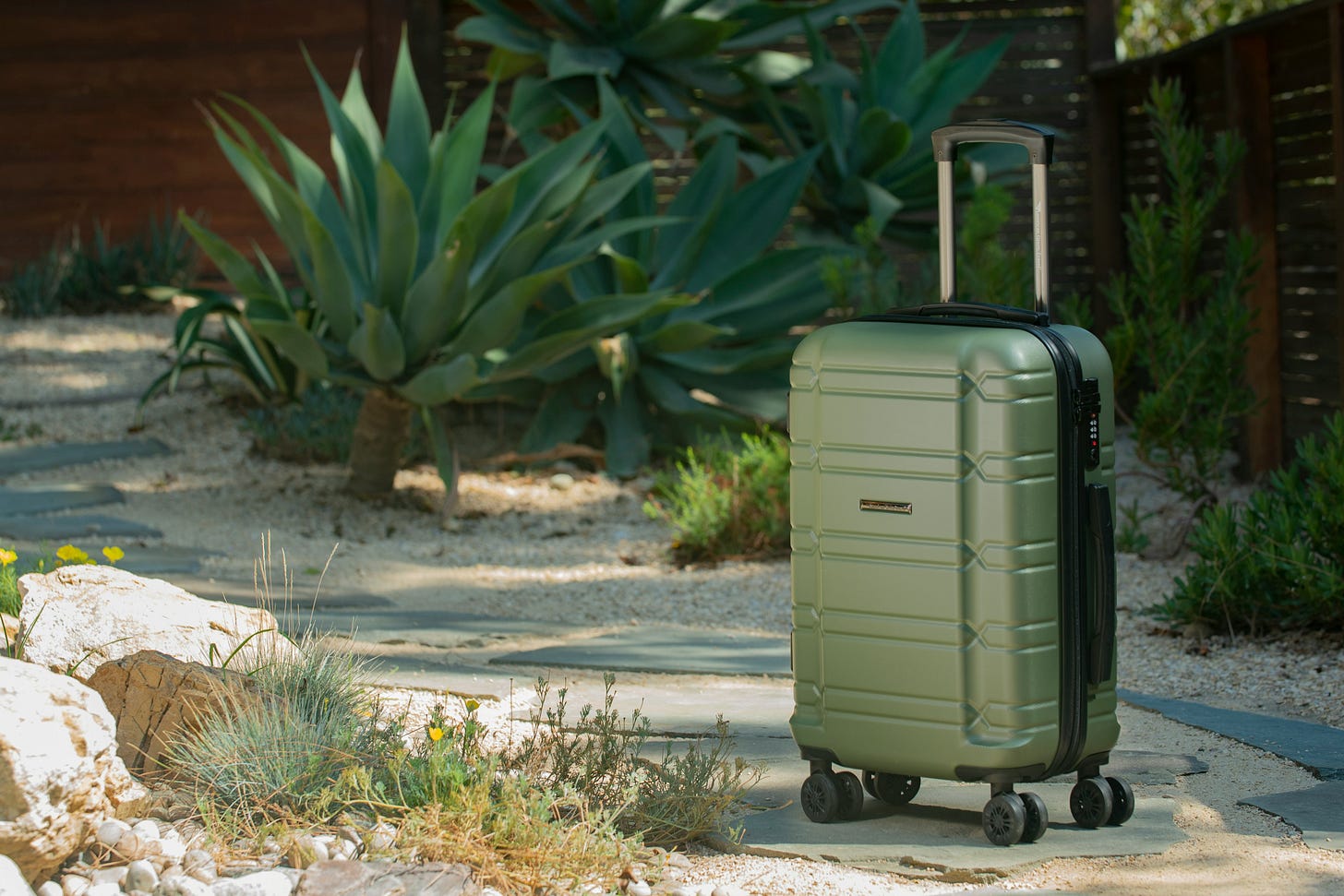 suitcase with healthy travel snacks inside including nuts, protein bars, meat sticks, hydration packets, and more suitcase with healthy travel snacks inside including nuts, protein bars, meat sticks, hydration packets, and more