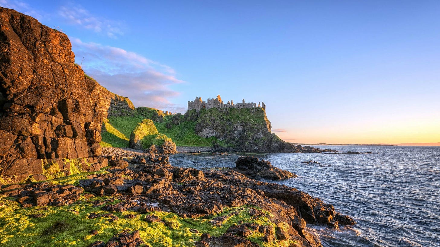 Download Castle On A Sea Cliffside iMac 4K Wallpaper | Wallpapers.com