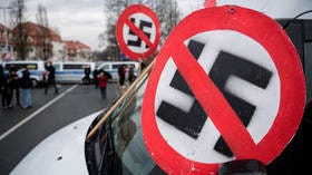 Putin vows to eradicate Nazism for good