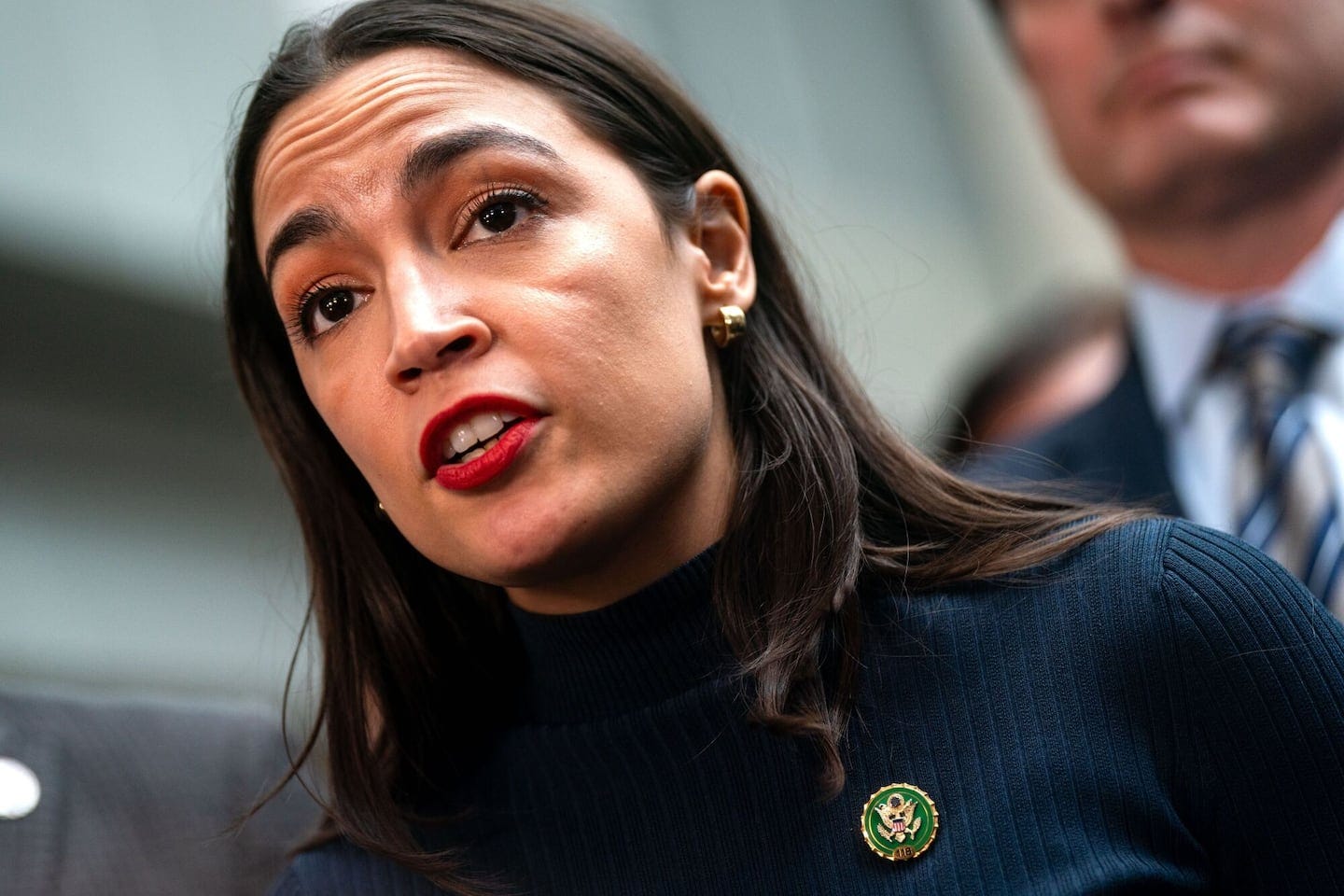 AOC fires back at Democrats calling on Biden to drop out