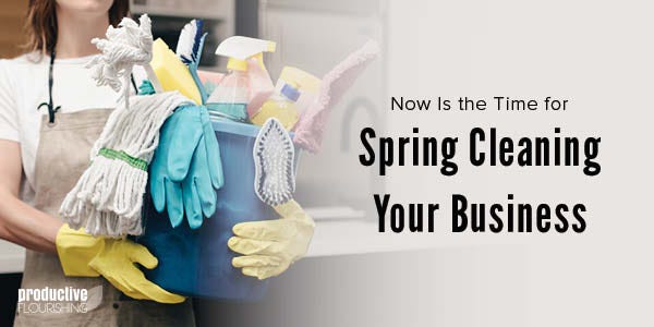 A woman is carrying a  bucket full of cleaning supplies. Text Overlay: Now Is the Time for Spring Cleaning Your Business