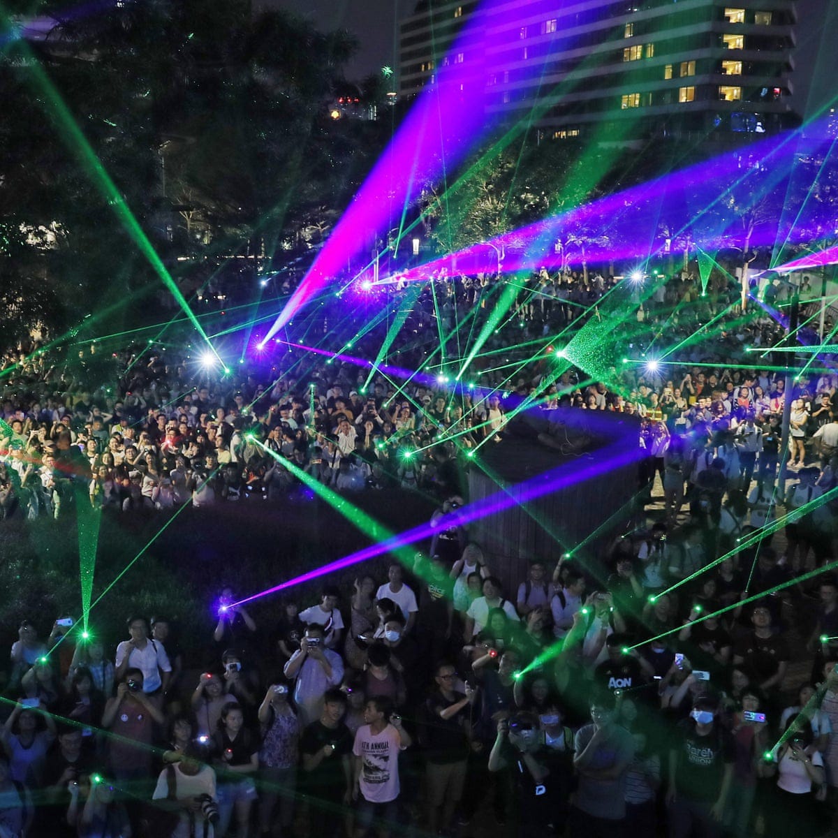 No tears, no blood': Hongkongers stage huge laser show to protest against  arrests | Hong Kong | The Guardian