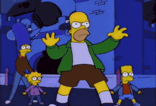 An animated gif from The Simpsons with Homer saying "Back, you robot. Nobody ruings my family vacations but me... and maybe the boy" with the rest of the family standing behind him in a darkened Itchy & Scratchy-Land.