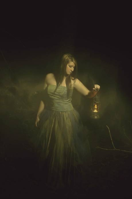 A person holding a lantern

AI-generated content may be incorrect.