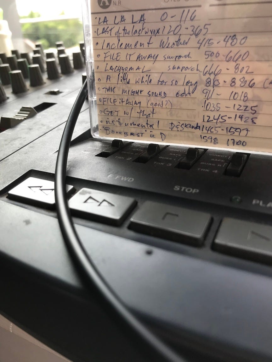 handwritten cassette tape with Faux Jean songs listed.