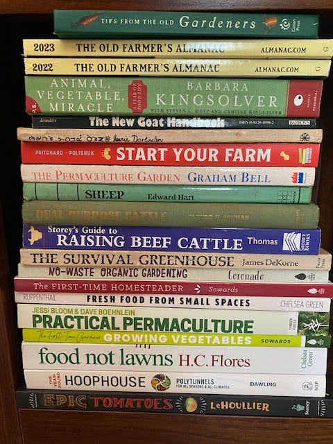 vertical stack of gardening books
